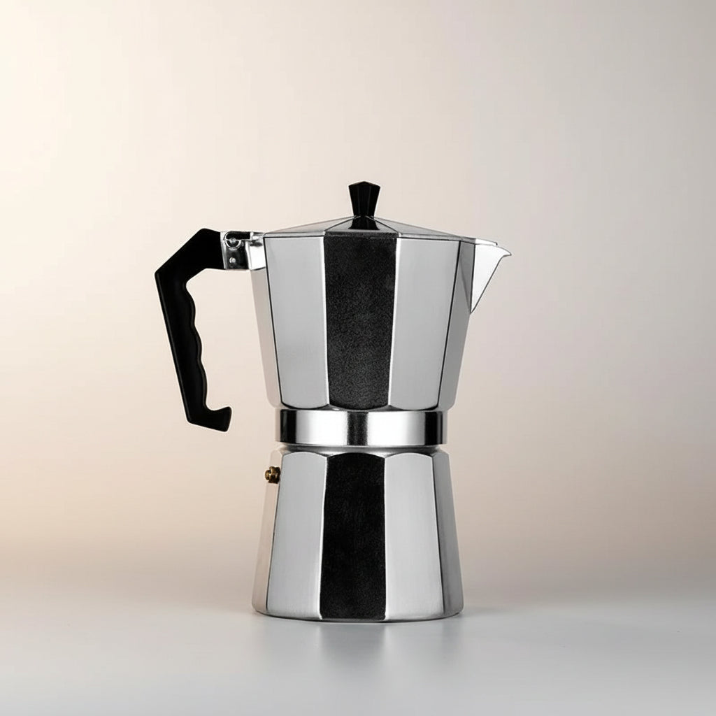Stainless steel Italian Moka Pot on a white background